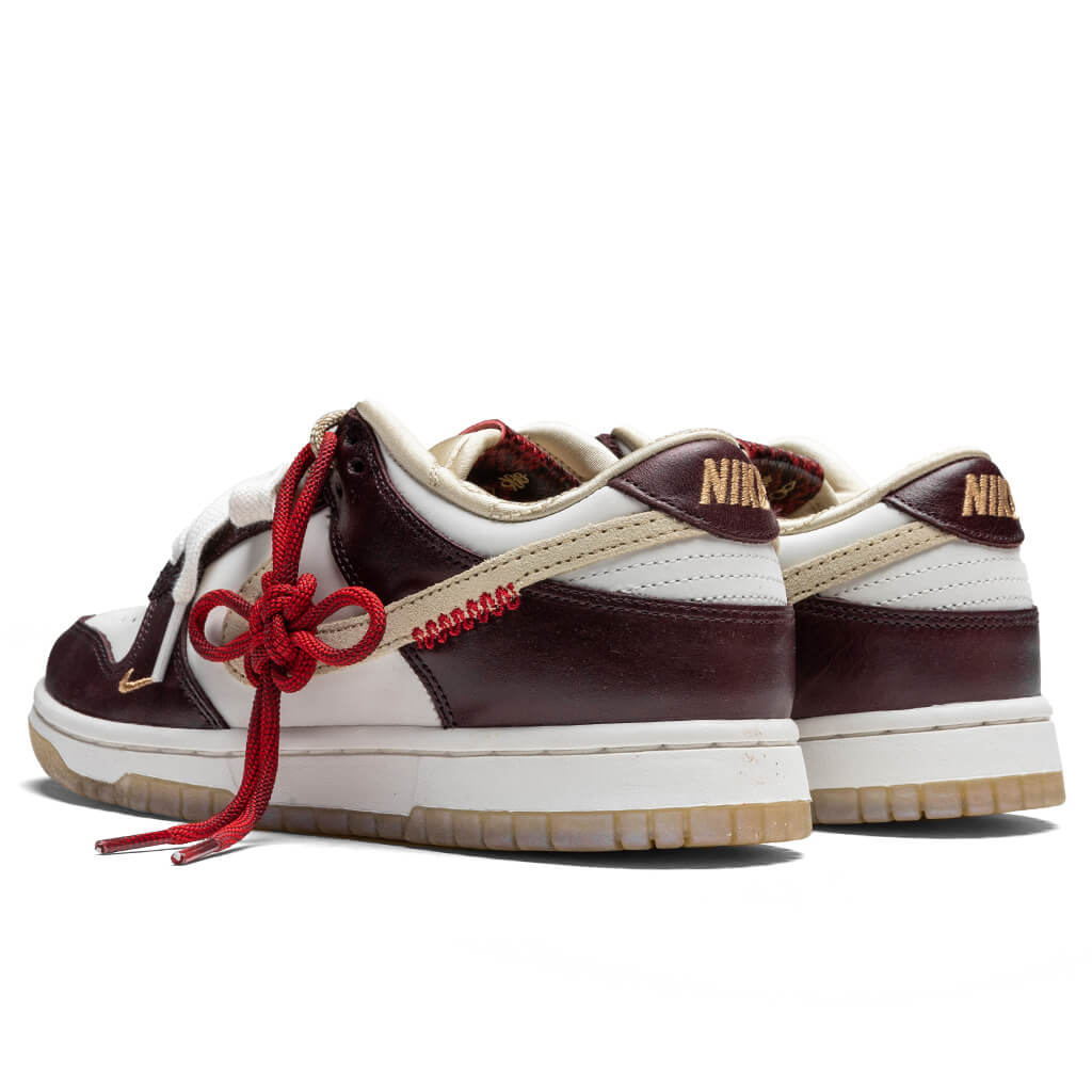 Womens Dunk Low Year Of The Snake Sail Team Gold Sail Burgundy Crush